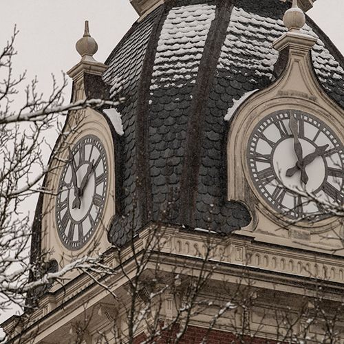 The Woodburn Hall clock tower after a snowfall in winter. 